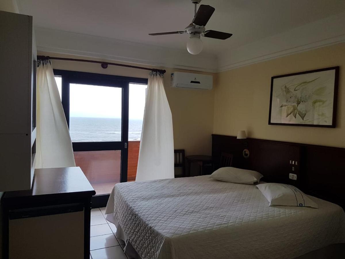 Quarto Quádruplo Premium