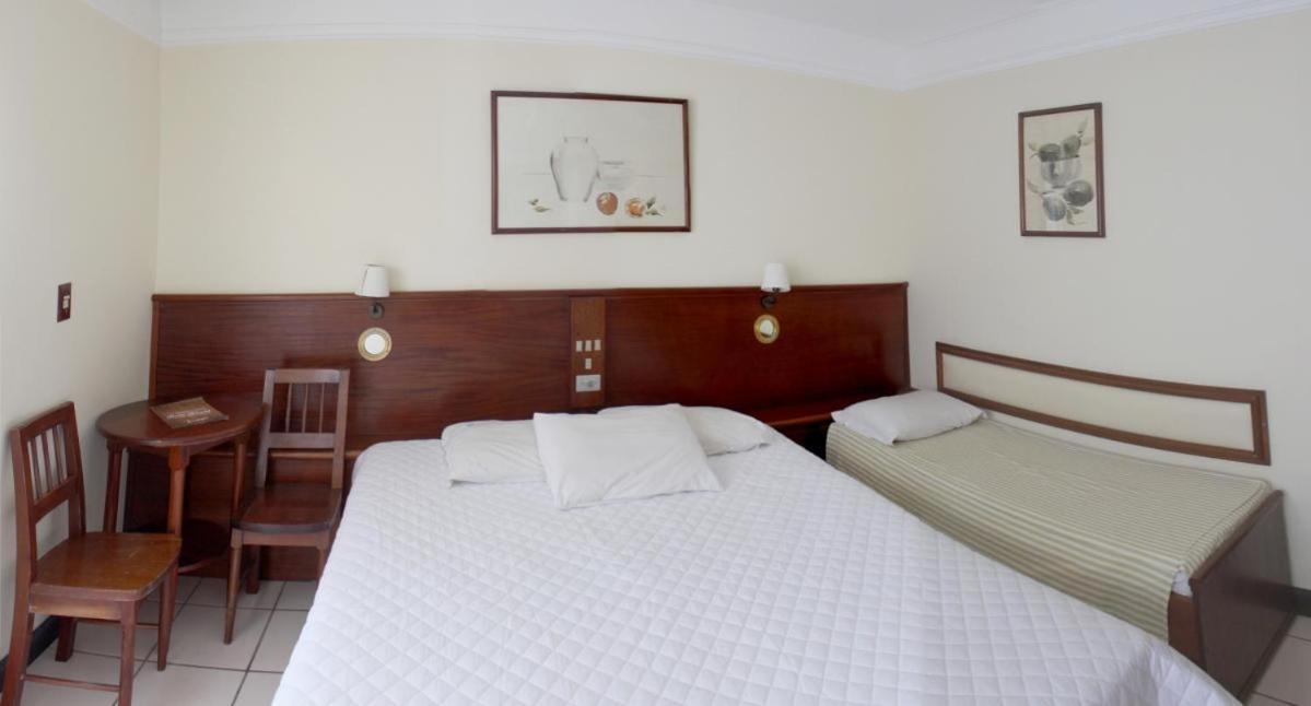 Quarto Quádruplo Premium